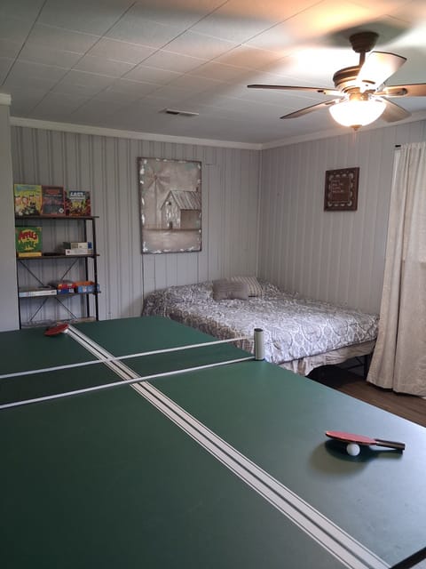 Game room with bed