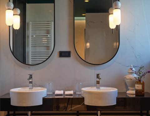 Shower, hair dryer, slippers, towels