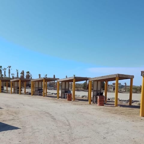 Private BBQs are not permitted at condos due to fire danger. Instead, a designated BBQ area with 8 grills is located about a 10-minute walk from the condos .