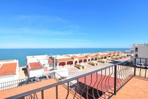 Unobstructed Sea of Cortez views from the rooftop balcony — the perfect spot for morning coffee, sunset drinks, or stargazing in this 4‑bedroom, 4‑bath beach side villa .