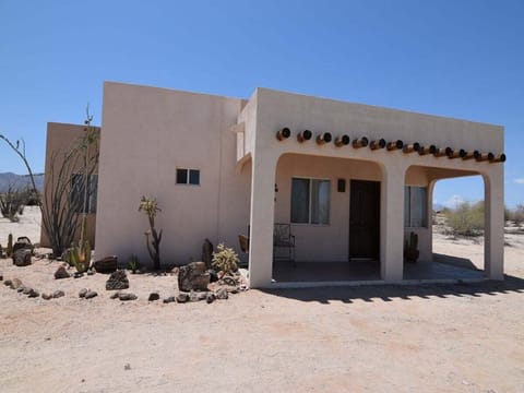 Casa Magers offers a private pool, hot tub, and palapa with outdoor kitchen inside El Dorado Ranch. 4 bedrooms, 3 baths, sleeps 10.