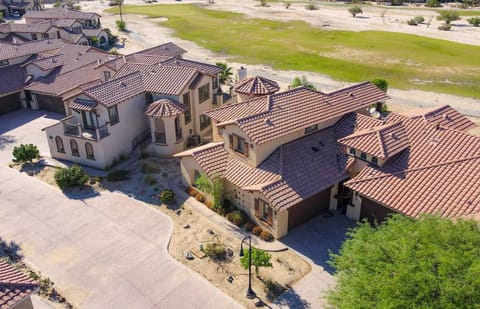 This 2-bedroom, 2-bath vacation rental is located directly across the street from the community pool. Features a king master suite with private bath, second king bedroom, gourmet kitchen, patio overlooking the golf course, and two-car garage .