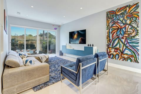 Home theater experience provided by the 60-inch Roku TV, setup w/ Sling streaming service