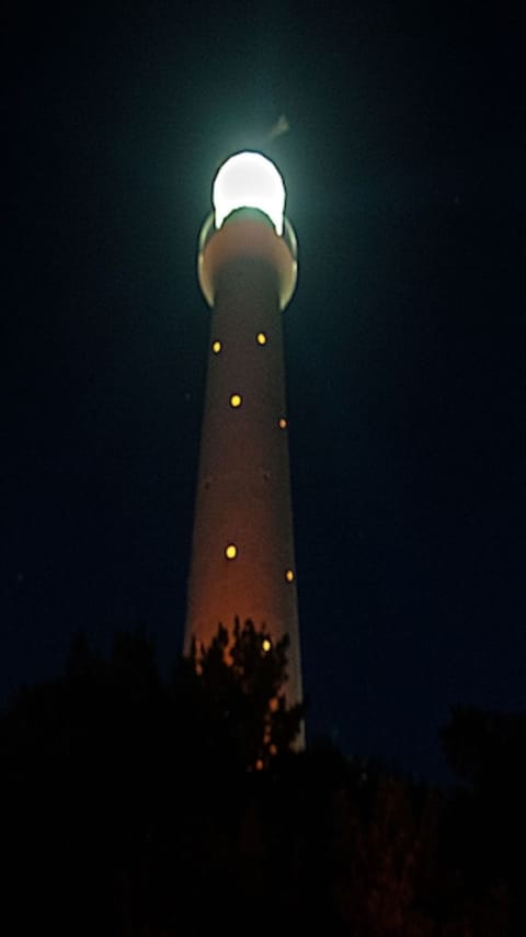 When the Gibb's Hill Lighthouse lights the night, love always finds its way home