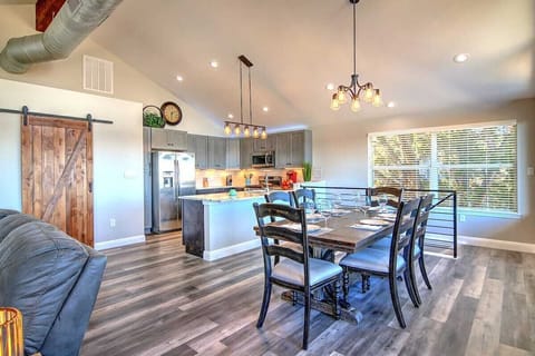 Dining table comfortably seats 6 but can extend for 8 plus kitchen bar seating. 