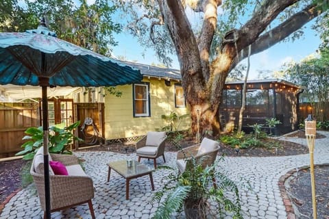 Private, fully fenced backyard. 400+ year old Live Oak tree coverage. Great out door furniture for relaxing and pavers to walk throughout the back. Exterior bistro lights run throughout the backyard, through the bamboo, and around the fencing.