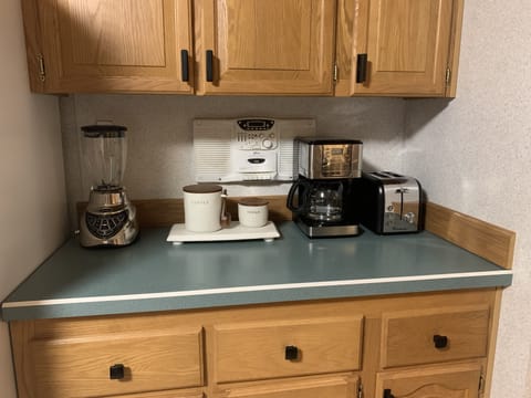 Coffee and tea station with complementary coffee and tea