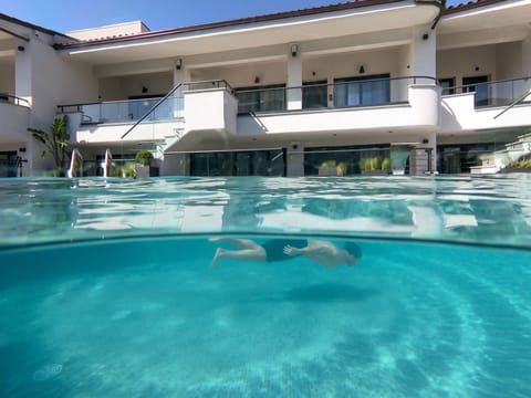 Seasonal outdoor pool, pool umbrellas, sun loungers