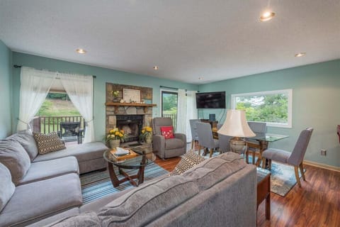Spacious living area with a large sectional and room for the whole crew.