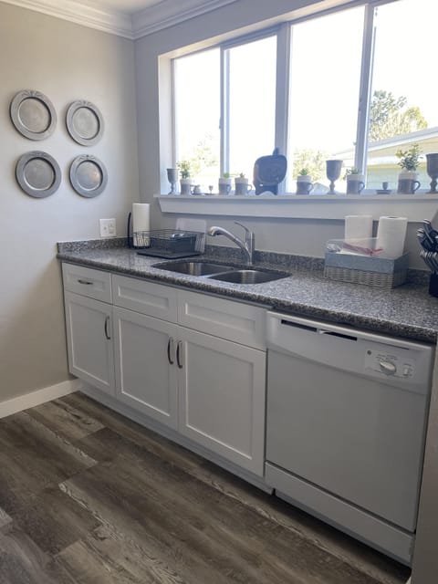 All new wood cabinets and granite countertops, dishwasher
