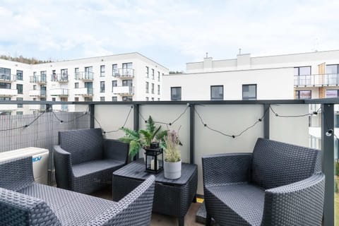 The balcony's peaceful ambiance is ideal for unwinding. 