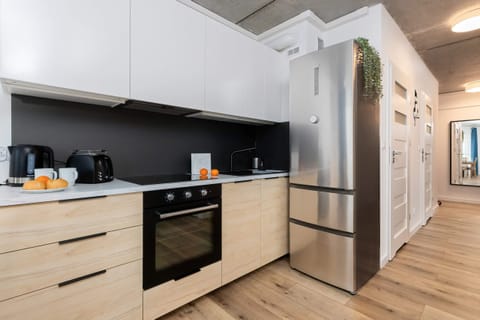 The fully equipped kitchenette includes everything you need for a home-cooked meal.