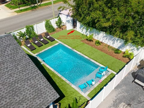 View of entrance from guest house pool leading to main house