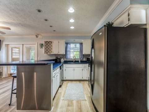 Open concept kitchen - easy flow to living room and patio