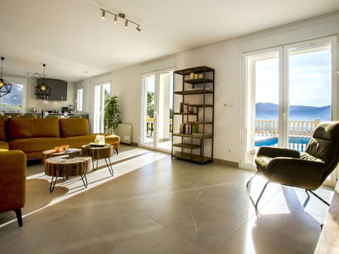 Furniture, Property, Couch, Table, Picture Frame, Chair, Interior Design, Wood, House, Bookcase