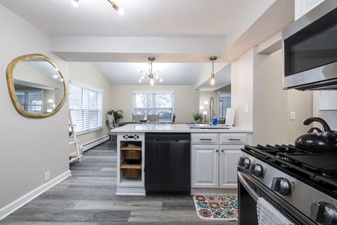 Kitchen open to dining room. bathroom on main floor is to the right 