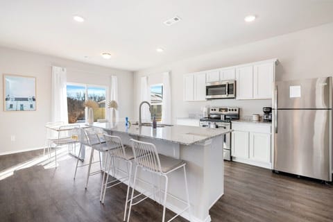 Here, you'll also find our four barstools, which sit between the living room and the kitchen.