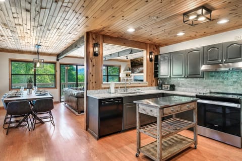 kitchen from the side door and staircase to upper level