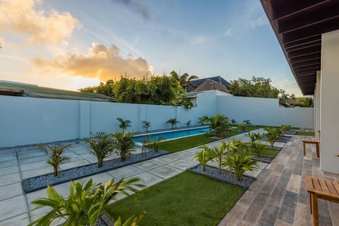 This is a NEW modern one bedroom apartment in a small private complex with four apartments in an amazing location. 
There is a shared pool and laundry area, great WiFi and air conditioning throughout, and control for each area.