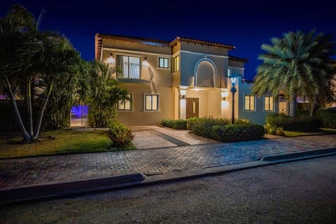 The mesmerizing view of the villa at night time.