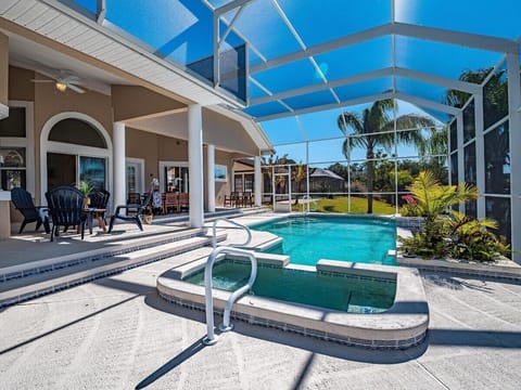 Soak in serene canal views from the crystal-clear pool