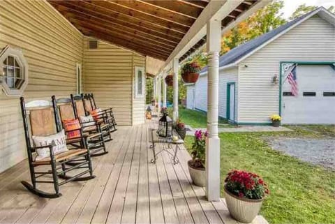Sit back and relax on the wrap around porch.