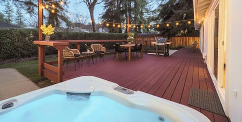 Relax and enjoy on the spacious patio and unwind in the hot tub - perfect for family time or evenings with friends.