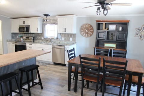 Plenty of pots and pans, and dishes for 6