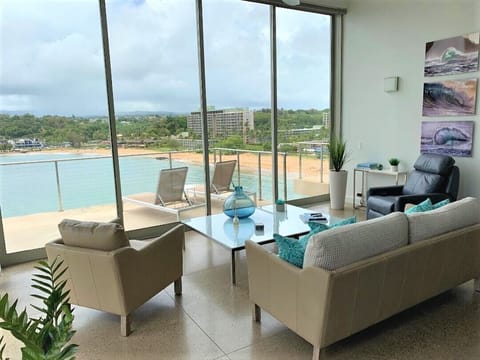Chaise lounges have been replaced with a dining table and loveseat