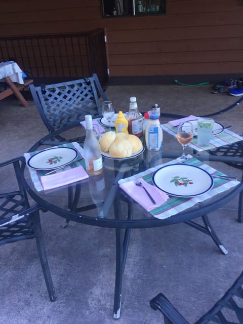 Deck has patio seating and a couple different dining options. 