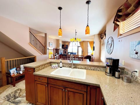 Beautiful granite counters throughout.  The kitchen has everything you'll need to entertain and keep the troops fed.  It has been very well stocked.