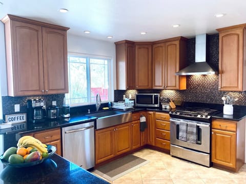 Full kitchen with everything you would need to whip up a fancy meal.