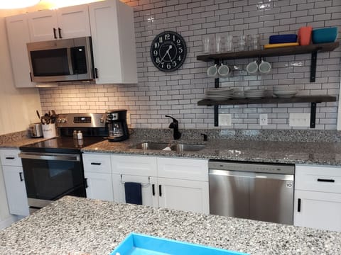 Kitchen - with new micro, oven, stove, ultra-quiet DW and fully stocked