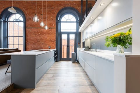 Luxuriously furnished self-catering apartment, modern kitchen complete with in-built appliances and hidden drawers.