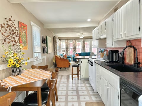 Kitchen and dining area open to living area. 