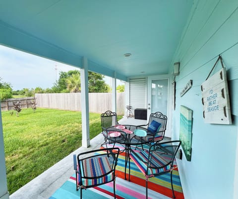 Private countryside setting in the fenced backyard with large covered patio