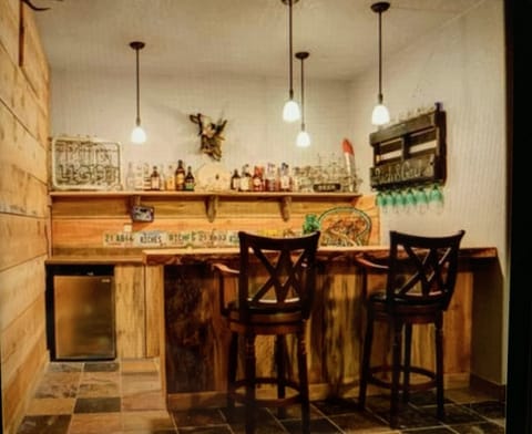 Beautiful custom made pine wood bar for entertaining in the basement area.  