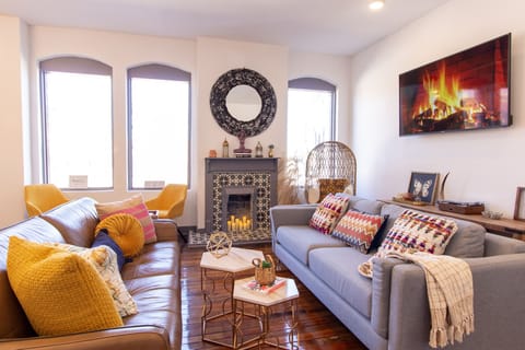 Leather couch not present any longer.