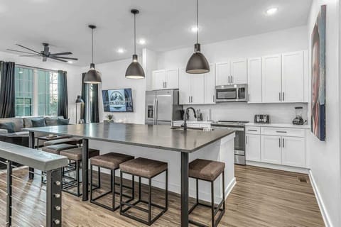 Enjoy the second-floor kitchen with a roomy 7-seat island counter.