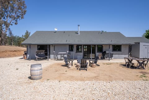 Gather around the fire pit on the open back patio