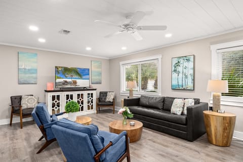 Within the open concept keeping room at the front of the home is a comfortable and well appointed living area. Roku TV is equipped with YouTube TV for live channels