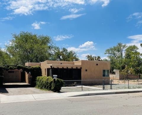 Front of the home with it's own privacy, street parking, and tandem parking spot