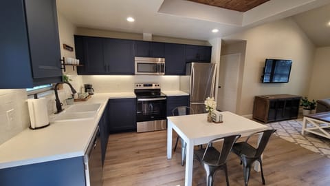 Fully stocked Kitchen with coffee station.