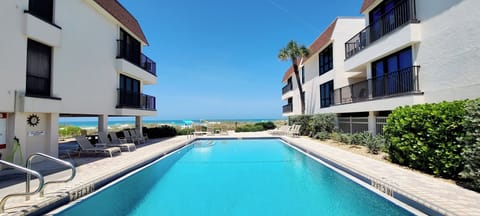 Water's Edge 204S Condo Pool and Beach View