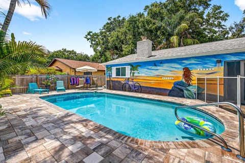 Beautiful private pool with floats & sun chairs. Equipped with a safety gate.