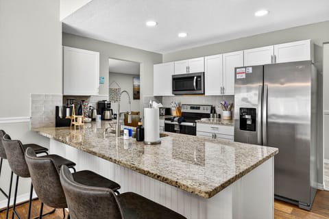 Fully equipped kitchen with all essentials and a full coffee station