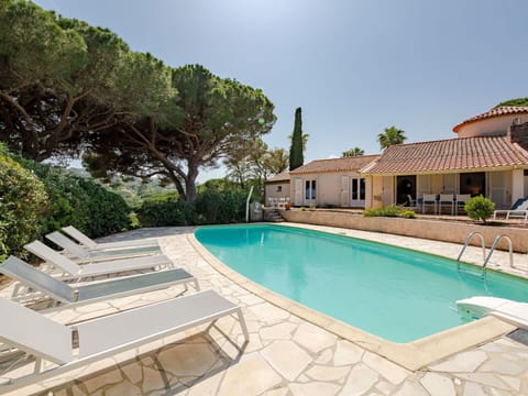Water, Sky, Property, Plant, Swimming Pool, Building, Tree, Outdoor Furniture, Shade, Chair