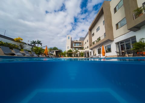 2 outdoor pools, open 7:00 AM to 6:00 PM, pool umbrellas, sun loungers
