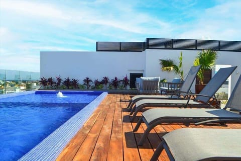 The incredible rooftop pool at condo building