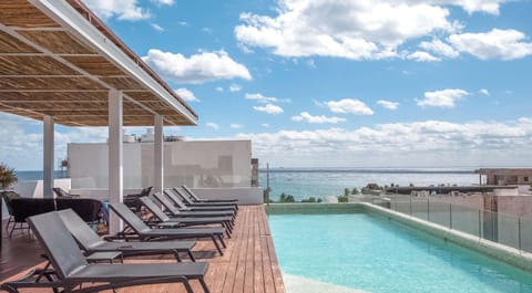 An incredible rooftop infinity pool with ocean view at the complex!